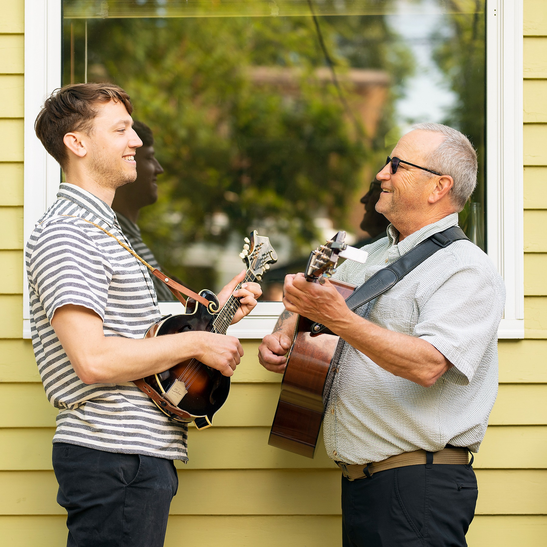 Nico and Bill Humby with mandolin and guitar