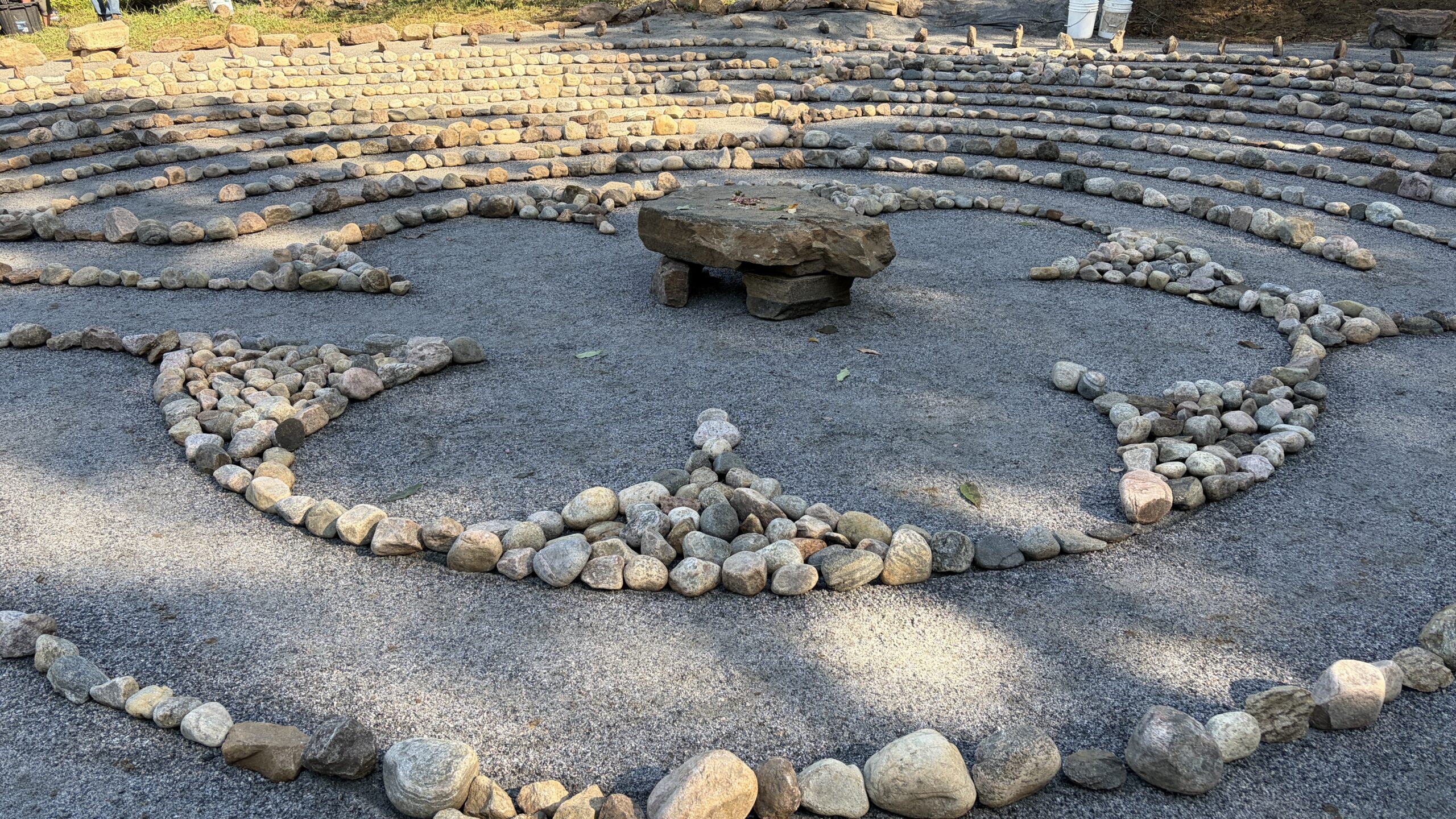 Centre of Stone Labyrinth at Rise Above Guest House Centre of a stone Labyrinth with large center stone